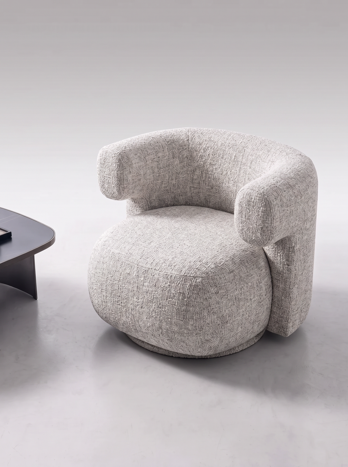 Fauteuil pivotant en tissu tweed et bois